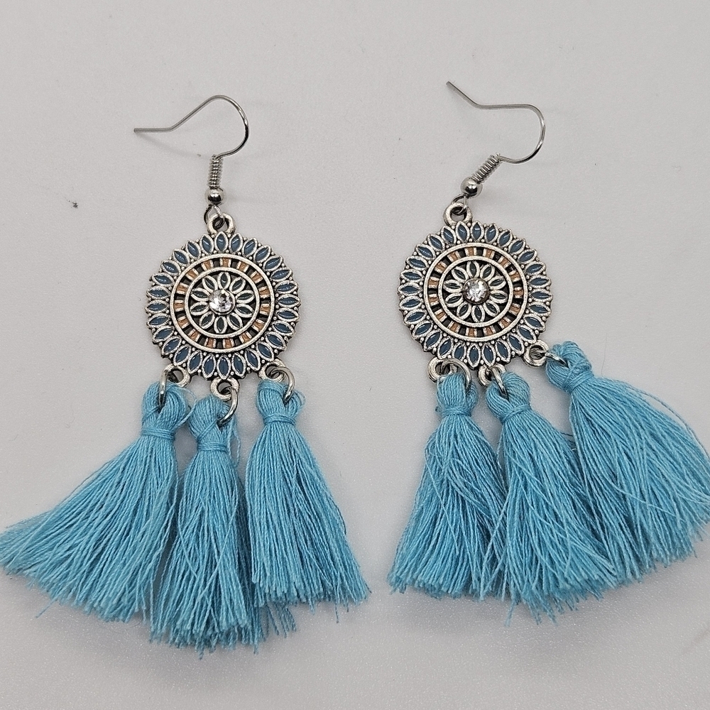 light blue and silver tone enamel disk earrings with tassels
